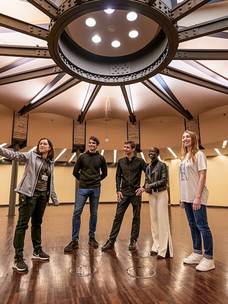 Visitors on the La Pedrera Sunrise Tour inside Casa Milà, Barcelona.