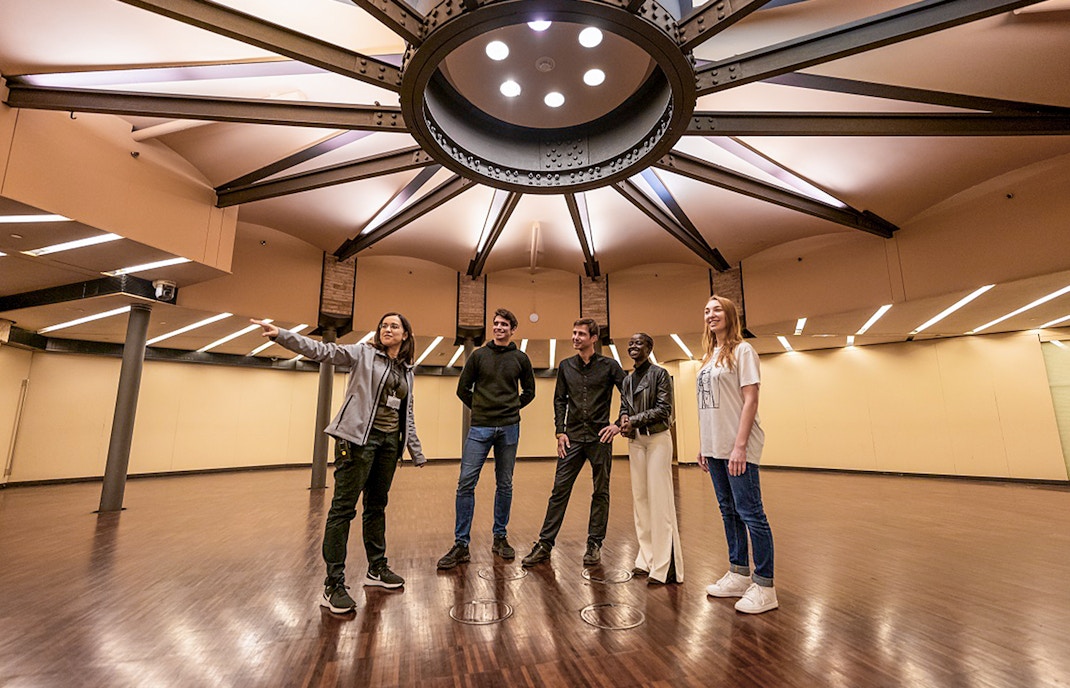 Visitors on the La Pedrera Sunrise Tour inside Casa Milà, Barcelona.