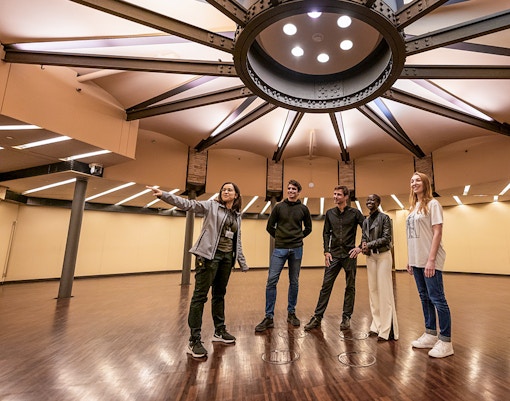 Visitors on the La Pedrera Sunrise Tour inside Casa Milà, Barcelona.
