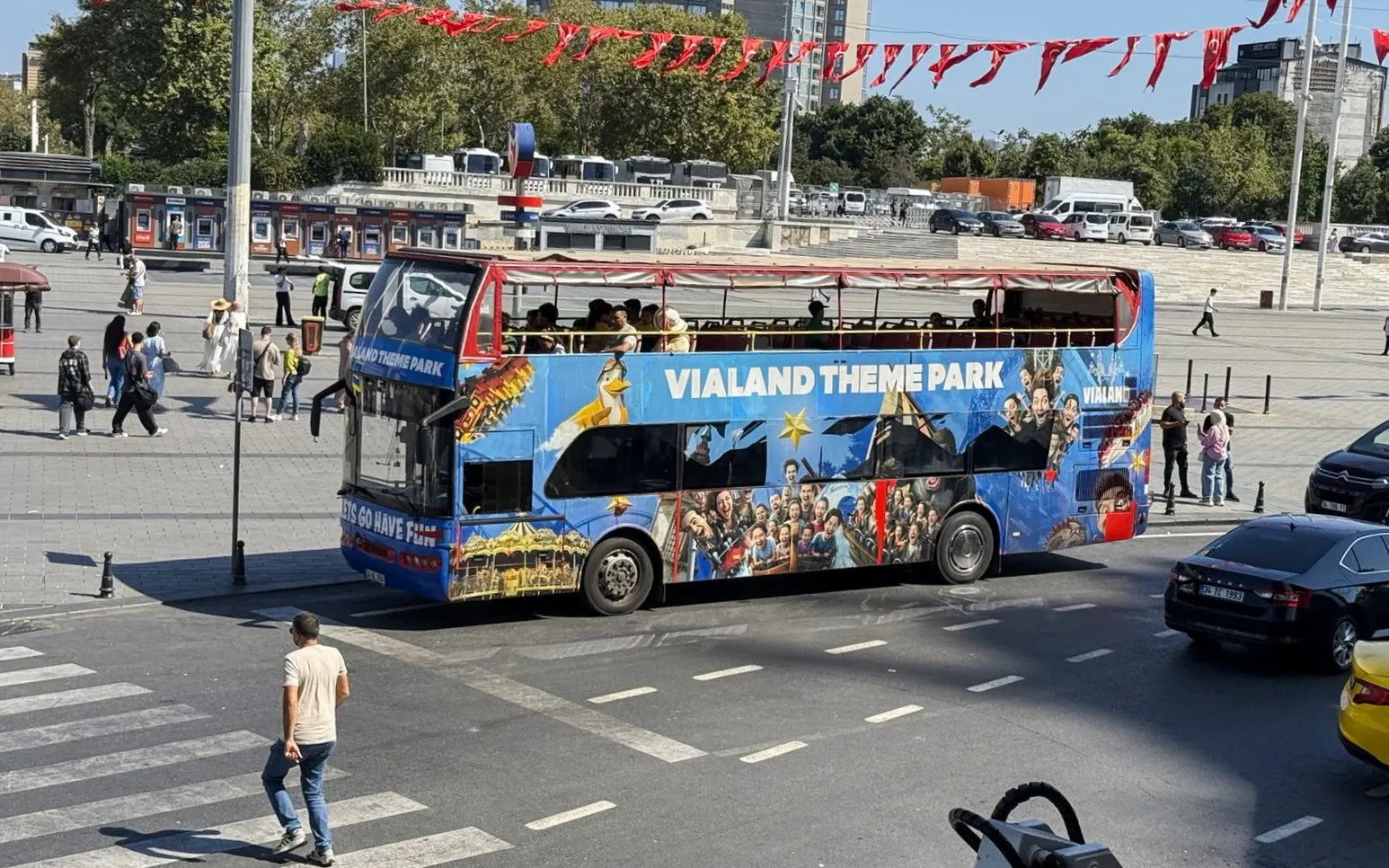 Shuttle bus for Vialand Theme Park in Istanbul at a city square.
