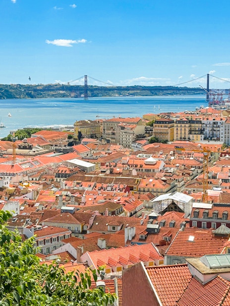 View of Lisbon rooftops and Tagus River from São Jorge Castle.