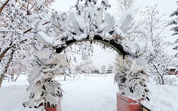 Antler arch covered in snow at Fairbanks Heritage Tour, Alaska.