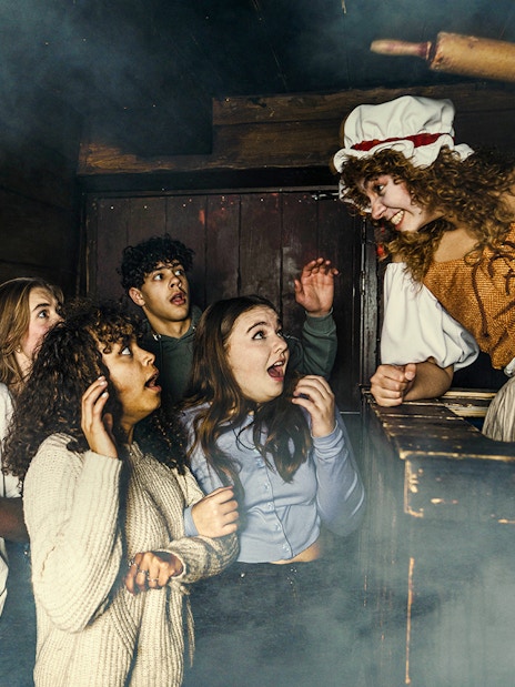 Guests reacting to a performer at the Amsterdam Dungeon.