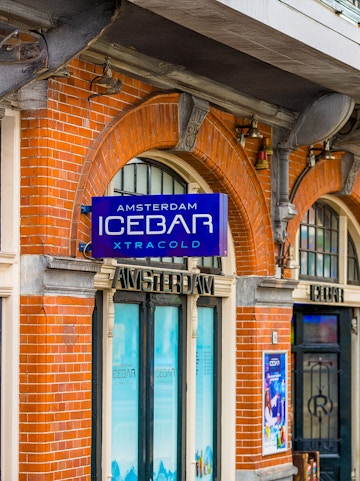 Xtracold Icebar entrance with blue sign in Amsterdam.
