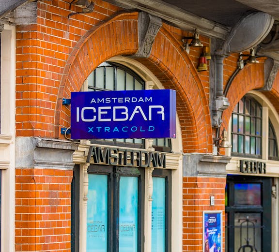 Xtracold Icebar entrance with blue sign in Amsterdam.