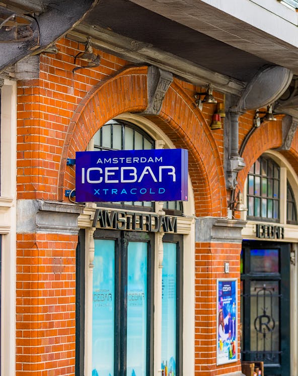 Xtracold Icebar entrance with blue sign in Amsterdam.
