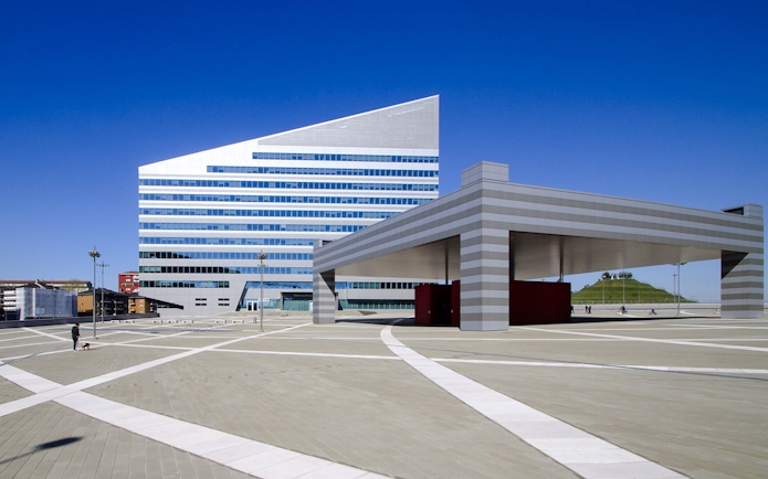 Casa Milan Museum exterior with modern architecture and open plaza in Milan, Italy.