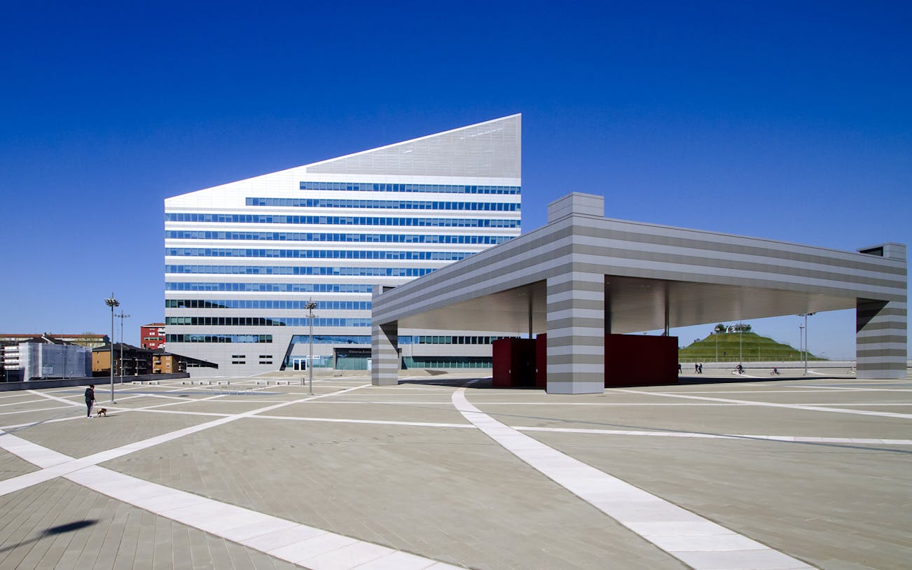 Casa Milan Museum exterior with modern architecture and open plaza in Milan, Italy.