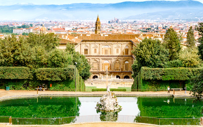Pitti Palace and Boboli Gardens with Florence cityscape in the background.