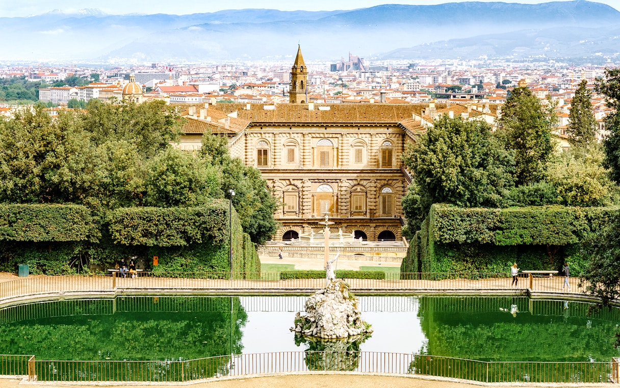 Pitti Palace and Boboli Gardens with Florence cityscape in the background.