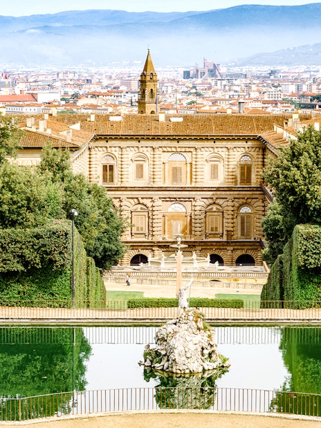 Pitti Palace and Boboli Gardens with Florence cityscape in the background.