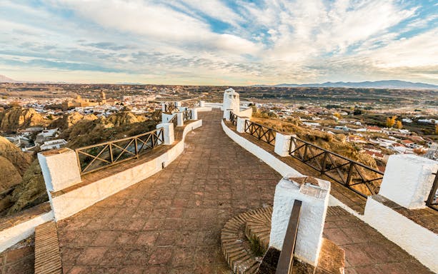 Walkway overlooking Guadix town and landscape on the Guadix & Tabernas Desert tour from Granada.