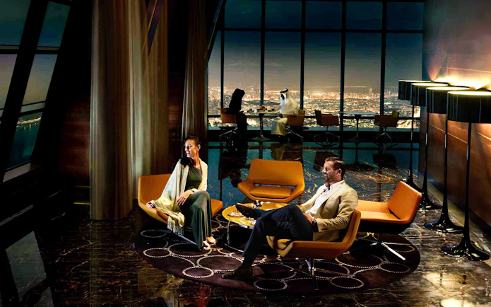 Guests enjoying the view at The Observation Deck at 300, Etihad Tower, Abu Dhabi.