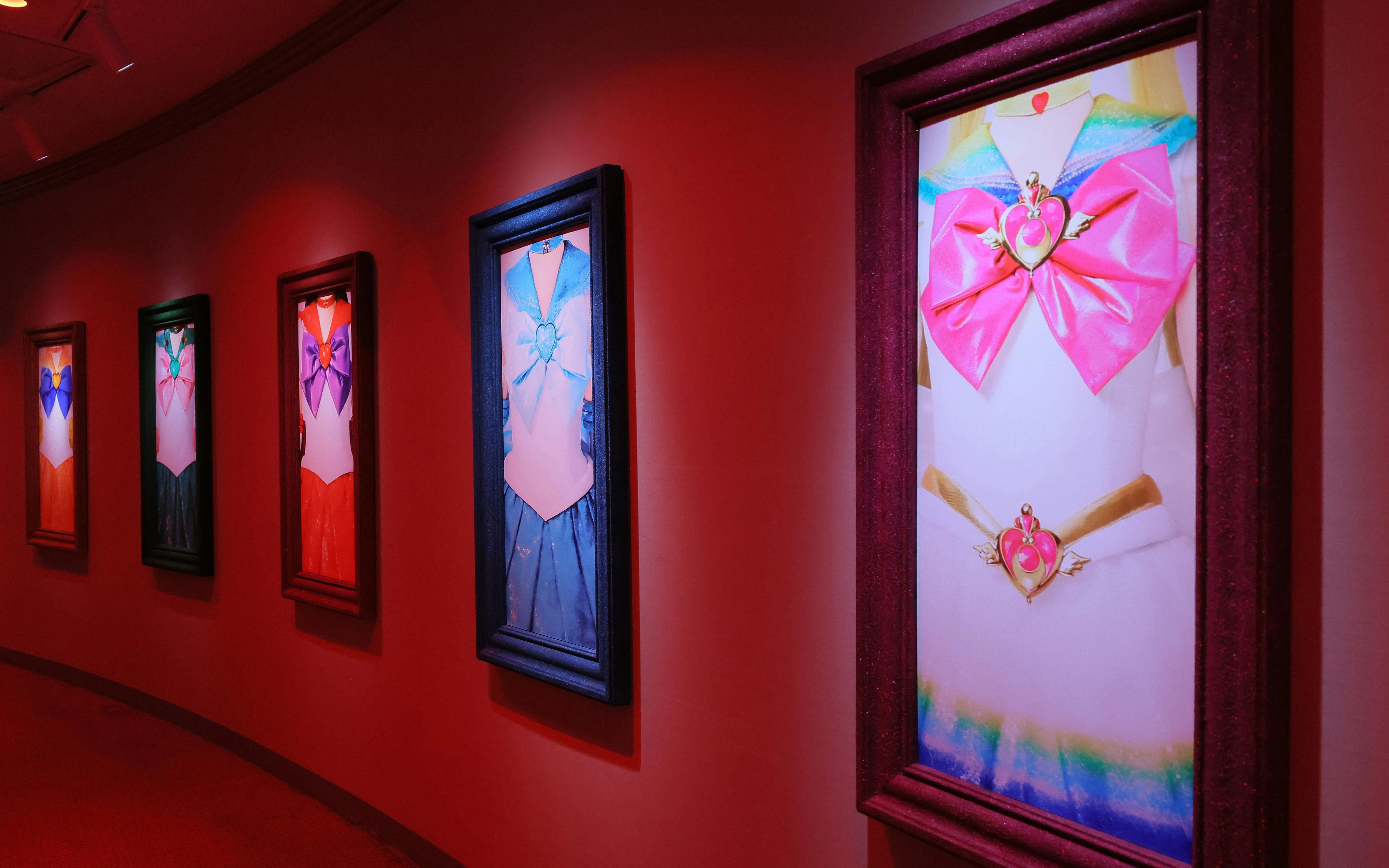 Framed Sailor Moon costumes displayed at Shining Theater Shinagawa, Tokyo.