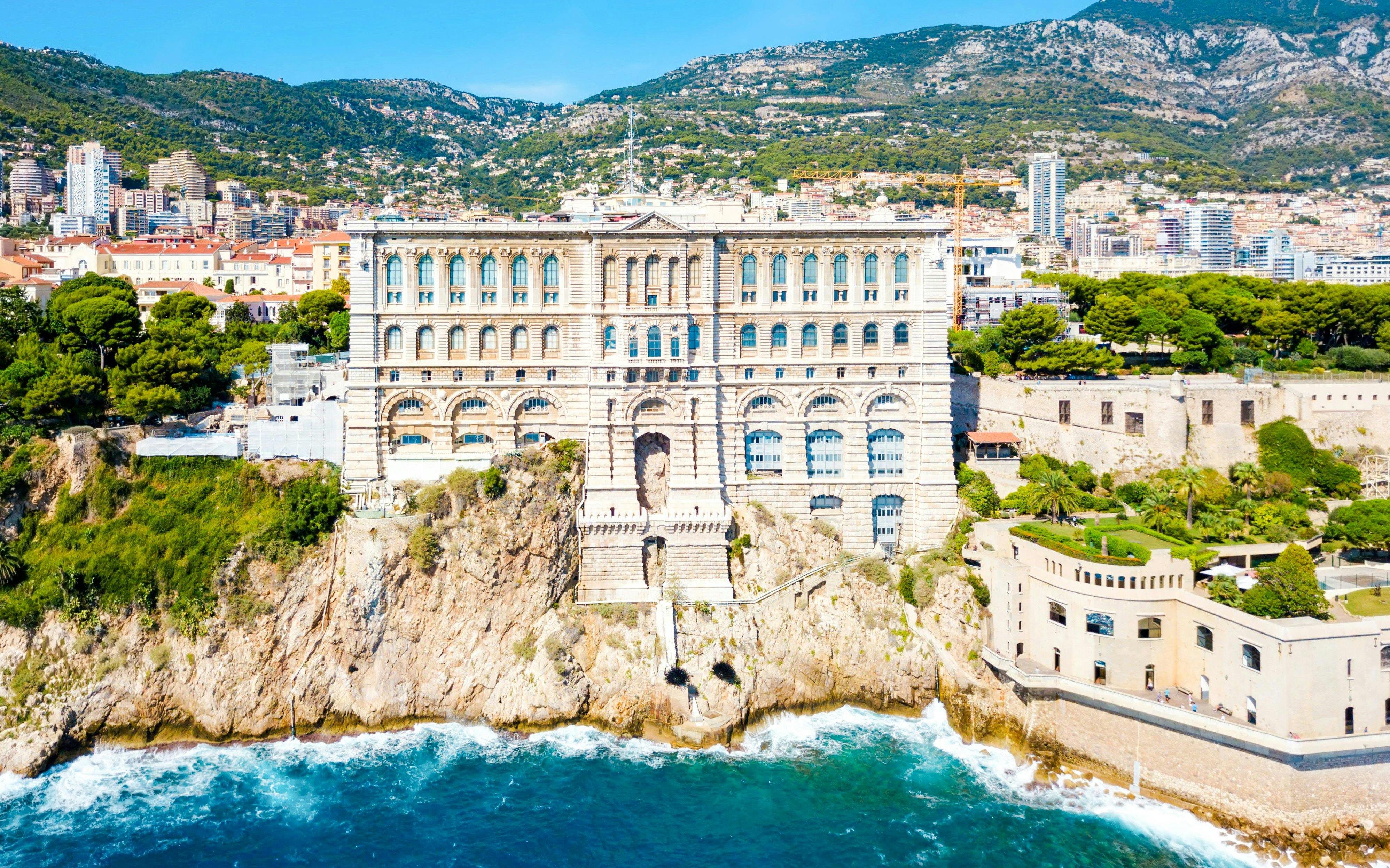 Oceanographic Museum in Monaco perched on a cliff overlooking the Mediterranean Sea.