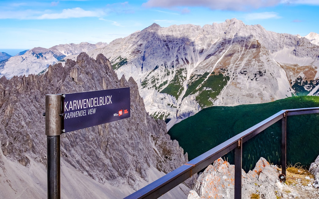 Karwendelblick viewpoint overlooking rugged mountains in Innsbruck, Austria.