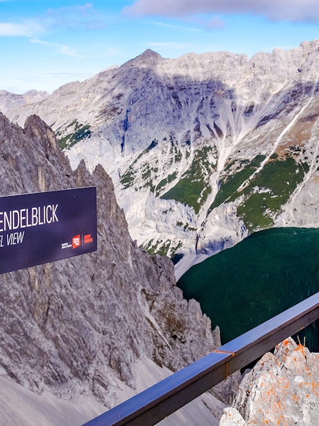 Karwendelblick viewpoint overlooking rugged mountains in Innsbruck, Austria.