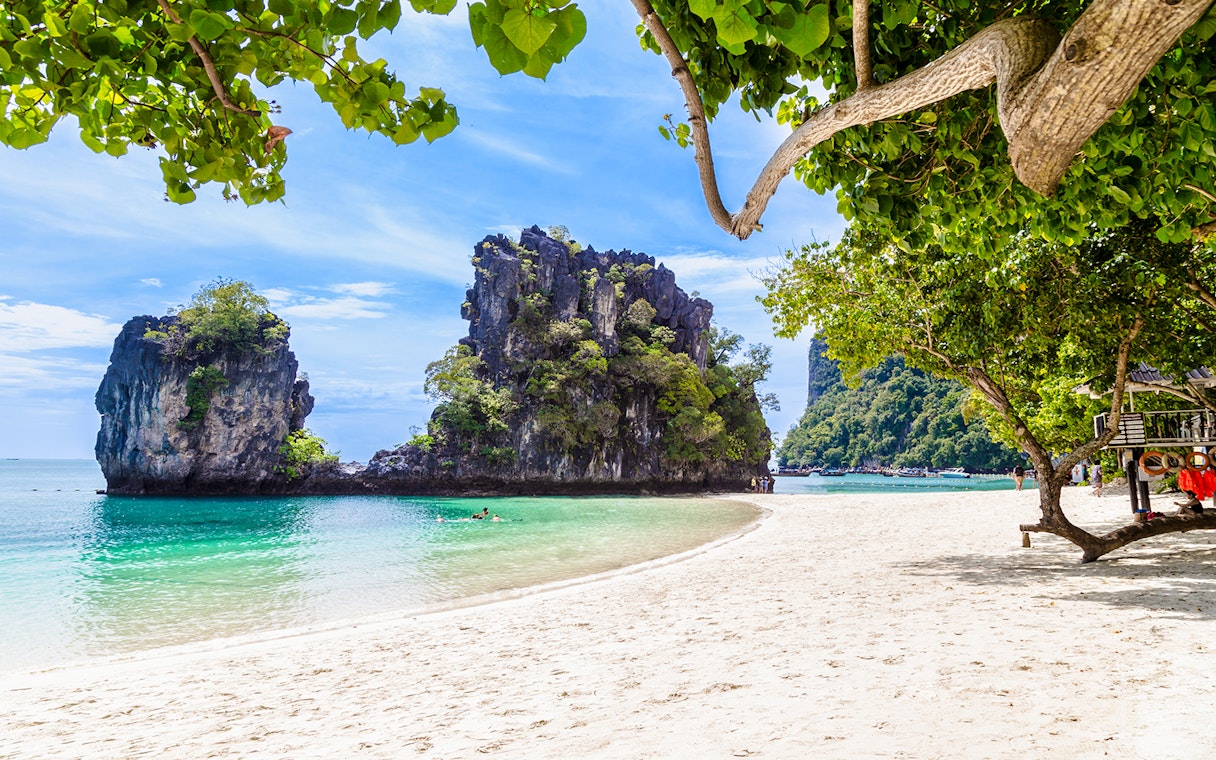 Tropical beach with limestone cliffs at Koh Hong island, Krabi.