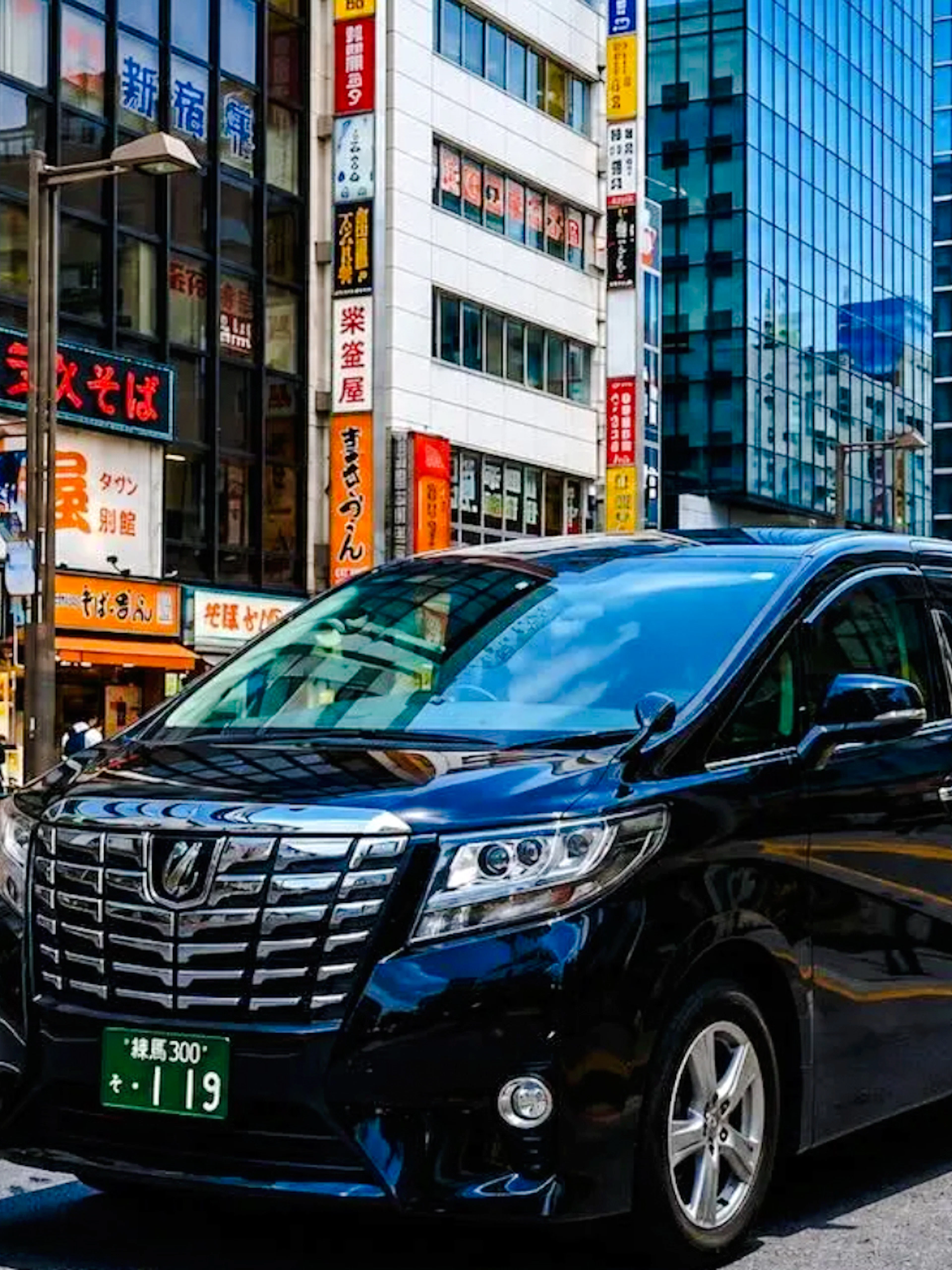 Private transfer vehicle in Tokyo city near Haneda Airport.