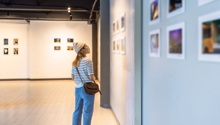 customers in National Gallery of Modern Art Museum - looking at painting
