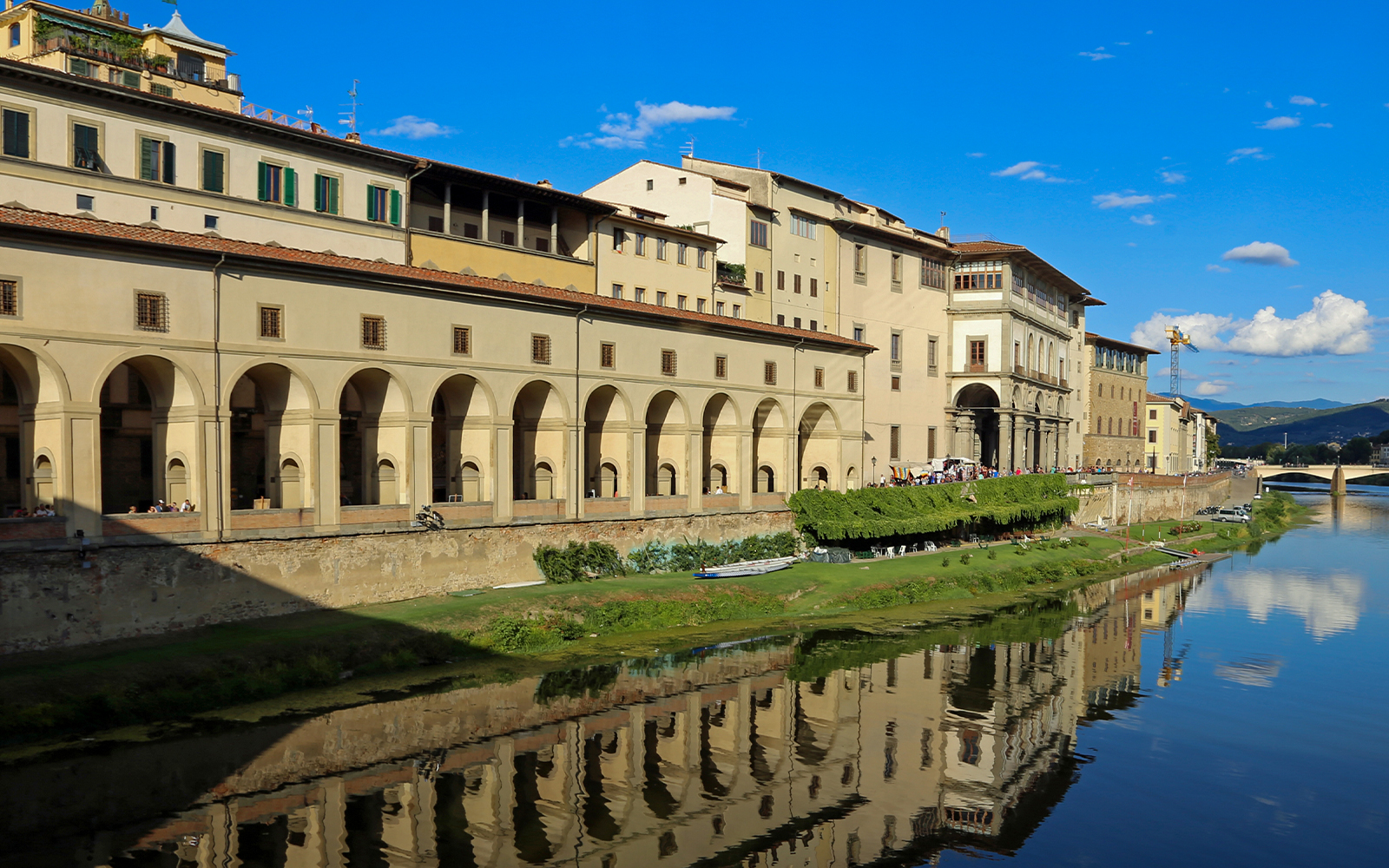 Uffizi Gallery exterior along the Arno River, Florence, Italy, part of guided tour.