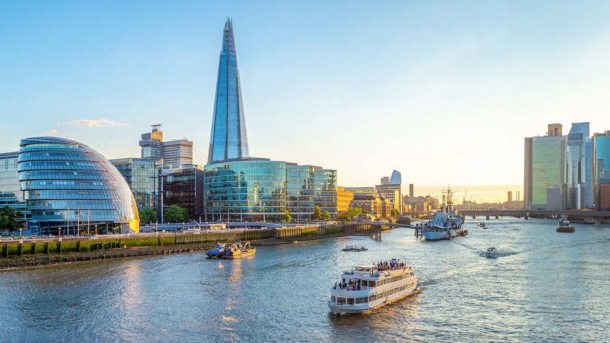 Sightseeing cruise on the Thames River near the Shard in London.