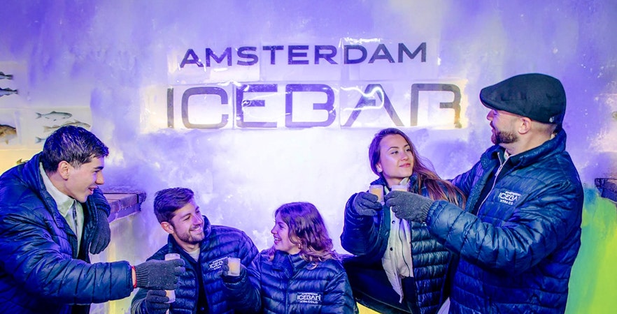 Guests enjoying drinks at the Xtracold Icebar in Amsterdam.