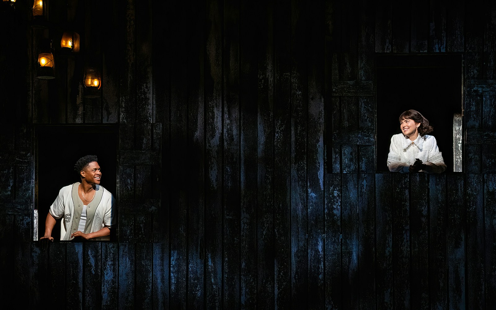 Two actors in a scene from the play "Our Town" on stage.