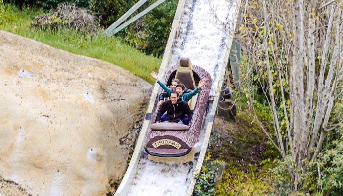 Visitors enjoying the Mina d'Or ride at Tibidabo Amusement Park, Barcelona.
