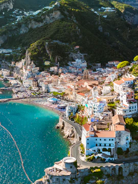 Aerial view of Amalfi Coast with colorful buildings and coastline, Italy.