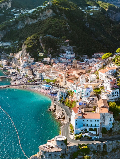 Aerial view of Amalfi Coast with colorful buildings and coastline, Italy.