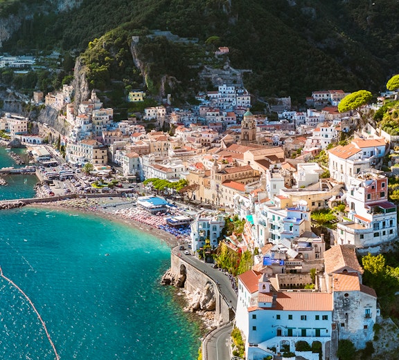 Aerial view of Amalfi Coast with colorful buildings and coastline, Italy.