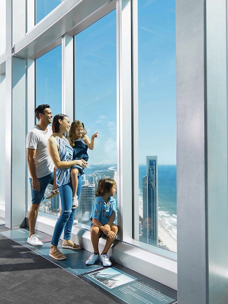 Family enjoying ocean views from SkyPoint Observation Deck, Gold Coast.
