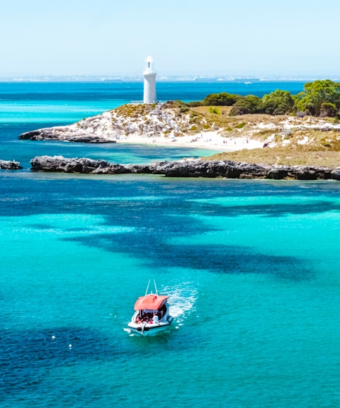 #Snorkel tour boat near Rottnest Island lighthouse, turquoise waters, Perth/Fremantle.