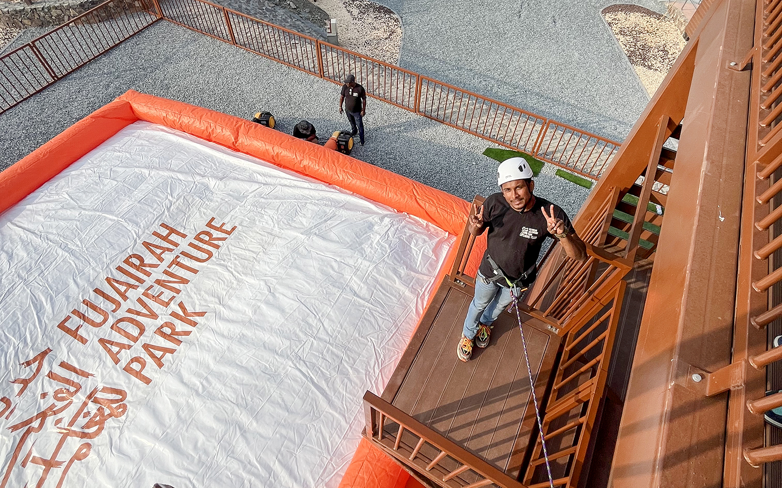 Man preparing for a jump at Fujairah Adventure Park with safety gear.