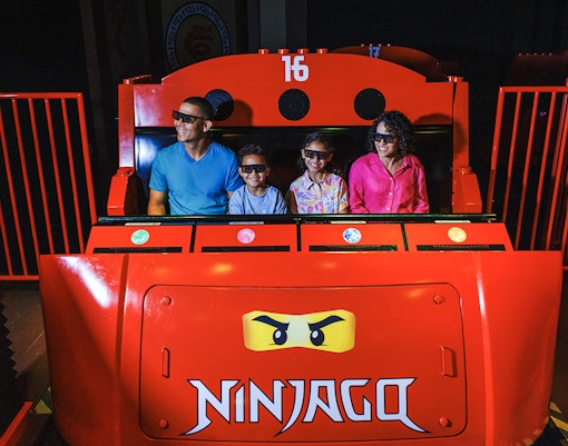 Guests enjoying Ninjago ride at Legoland New York.