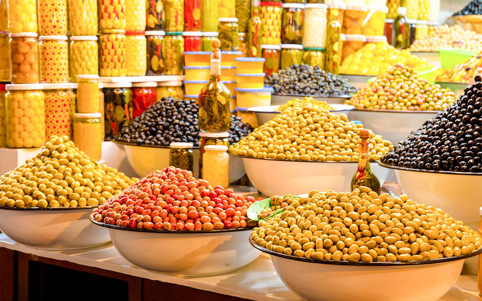 Assortment of olives in bowls at Jema el Fna market, Marrakesh.
