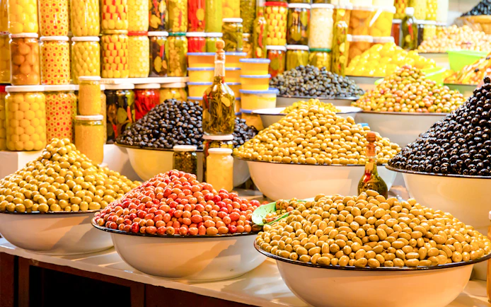 Assortment of olives in bowls at Jema el Fna market, Marrakesh.