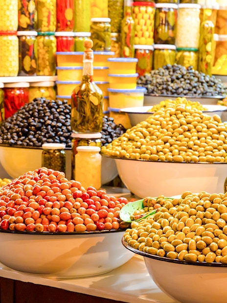Assortment of olives in bowls at Jema el Fna market, Marrakesh.