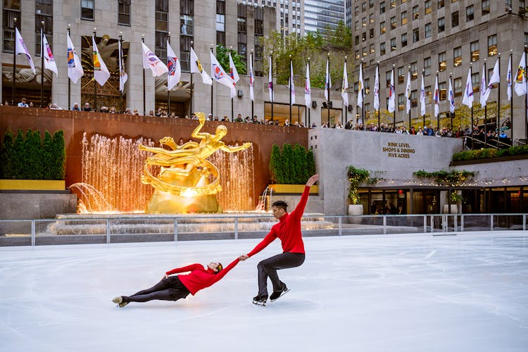 Tourists enjoying ice skating at The Rink