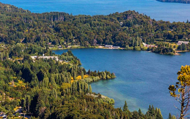 Tranquil lake with surrounding forests along the Small Circuit near Bariloche.