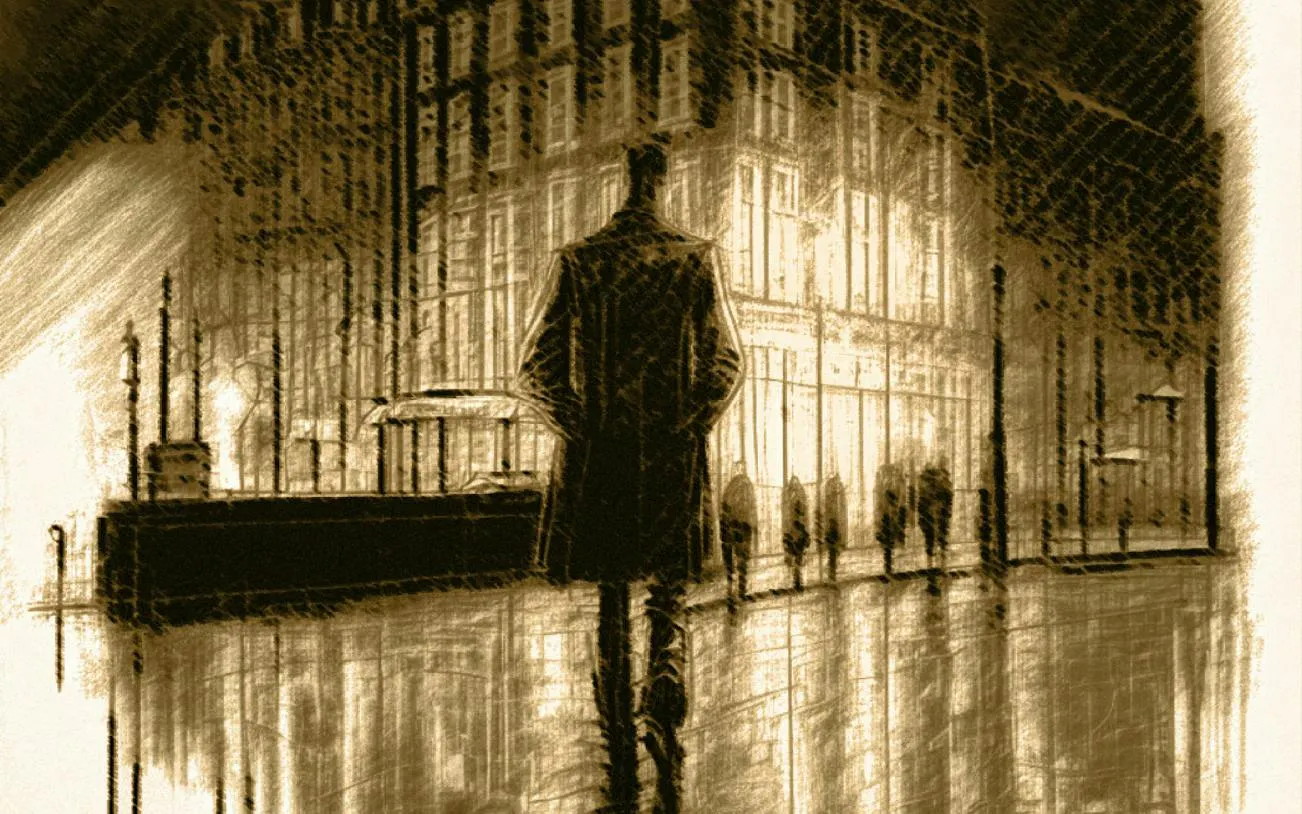Man walking in Copenhagen's Royal District at night, reflecting on wet pavement.