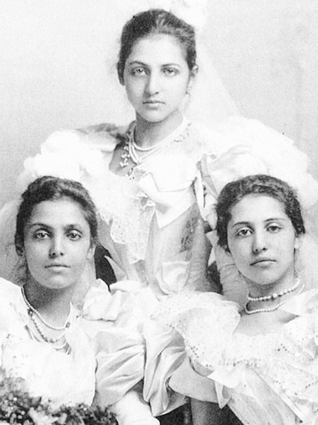 Three women in Victorian dresses at Kensington Palace's Last Princesses of Punjab exhibition.