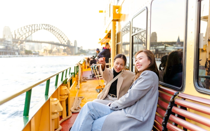 Sydney Harbour cruise with view of Harbour Bridge in the background.
