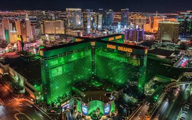 Las Vegas Strip aerial view at night featuring illuminated MGM Grand Hotel.