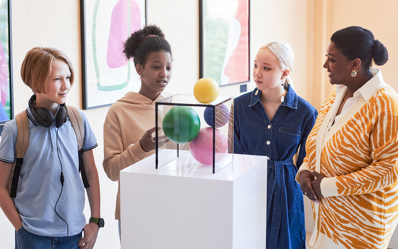 Visitors exploring marine life exhibits at Blue Planet Aquarium, Cheshire, UK.