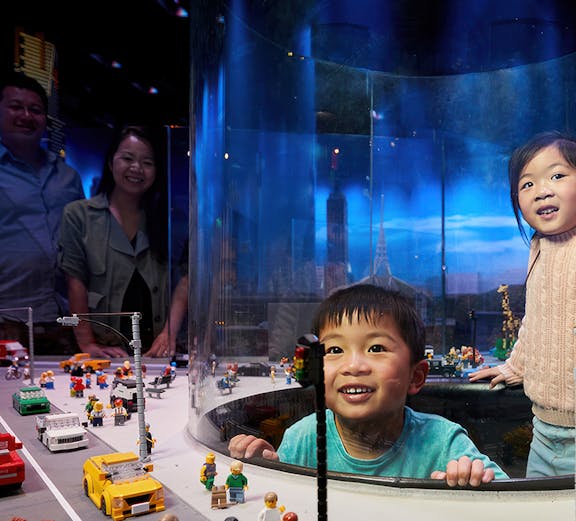Children enjoying a LEGO city exhibit during a school holiday special in Melbourne.