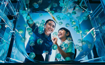 Visitors enjoying jellyfish exhibit at Singapore Oceanarium Marine Adventure.