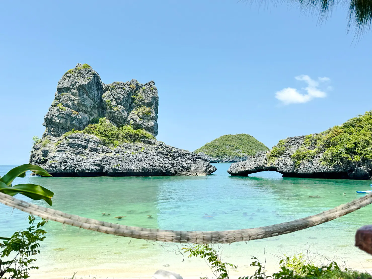Rock formations and clear waters at Anthong Marine Park, Koh Samui, viewed from a hammock.