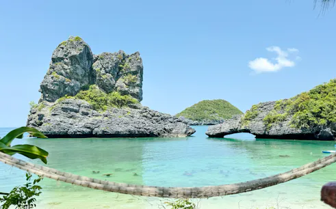 Rock formations and clear waters at Anthong Marine Park, Koh Samui, viewed from a hammock.